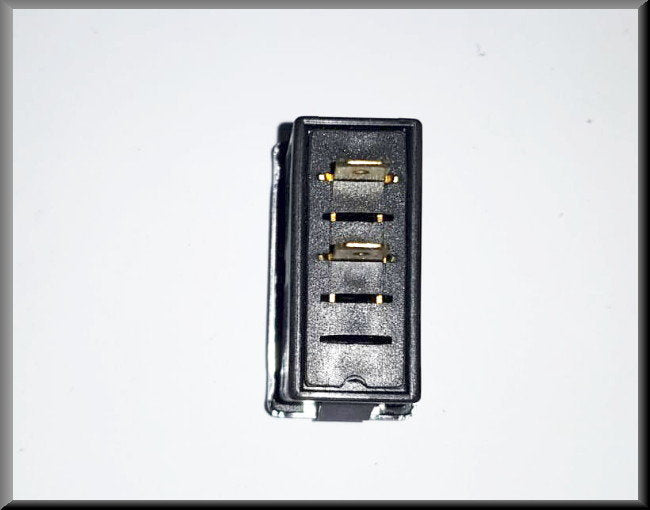 Rear window wiper/washer function switch with chrome trim.
