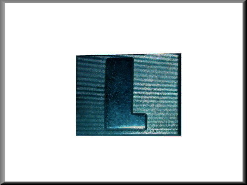 Embleem achterklep – Renault 12 L – OEM 7700517