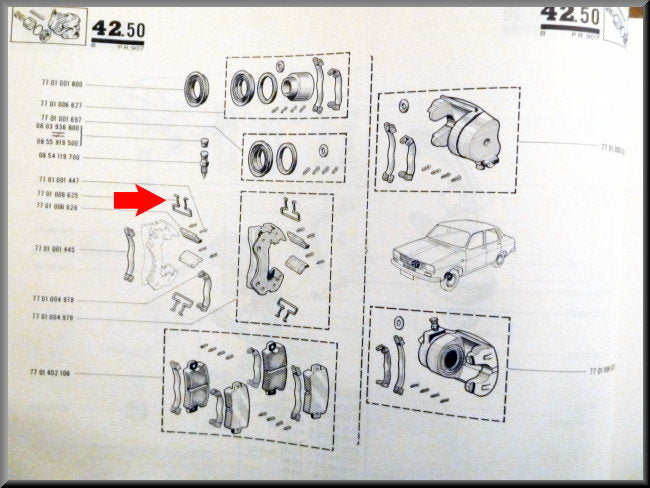 Brake caliper retaining spring.