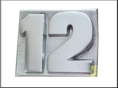 Tailgate emblem – Renault 12 – OEM 7700564043