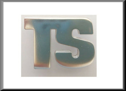 Embleem " – Renault 12 TS – OEM 7700551766