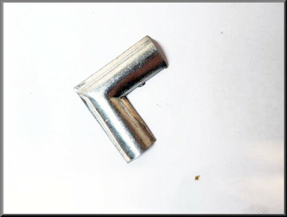 Jonction de jonc chromé de lunette arrière – Renault 12 – OEM 7700537584 / 7700510159