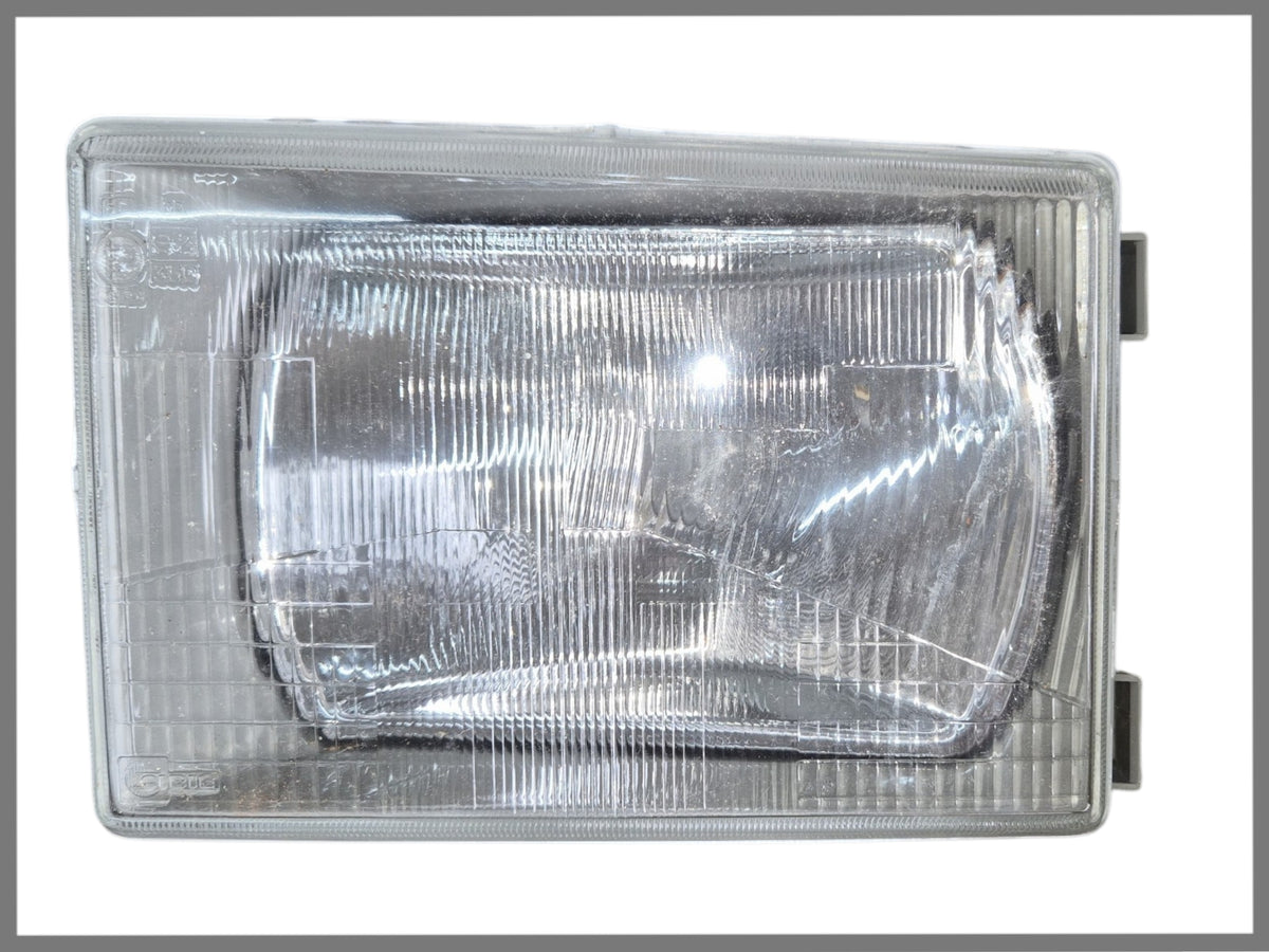 Phare avant gauche RHD - Renault Trafic - OEM 7701025786